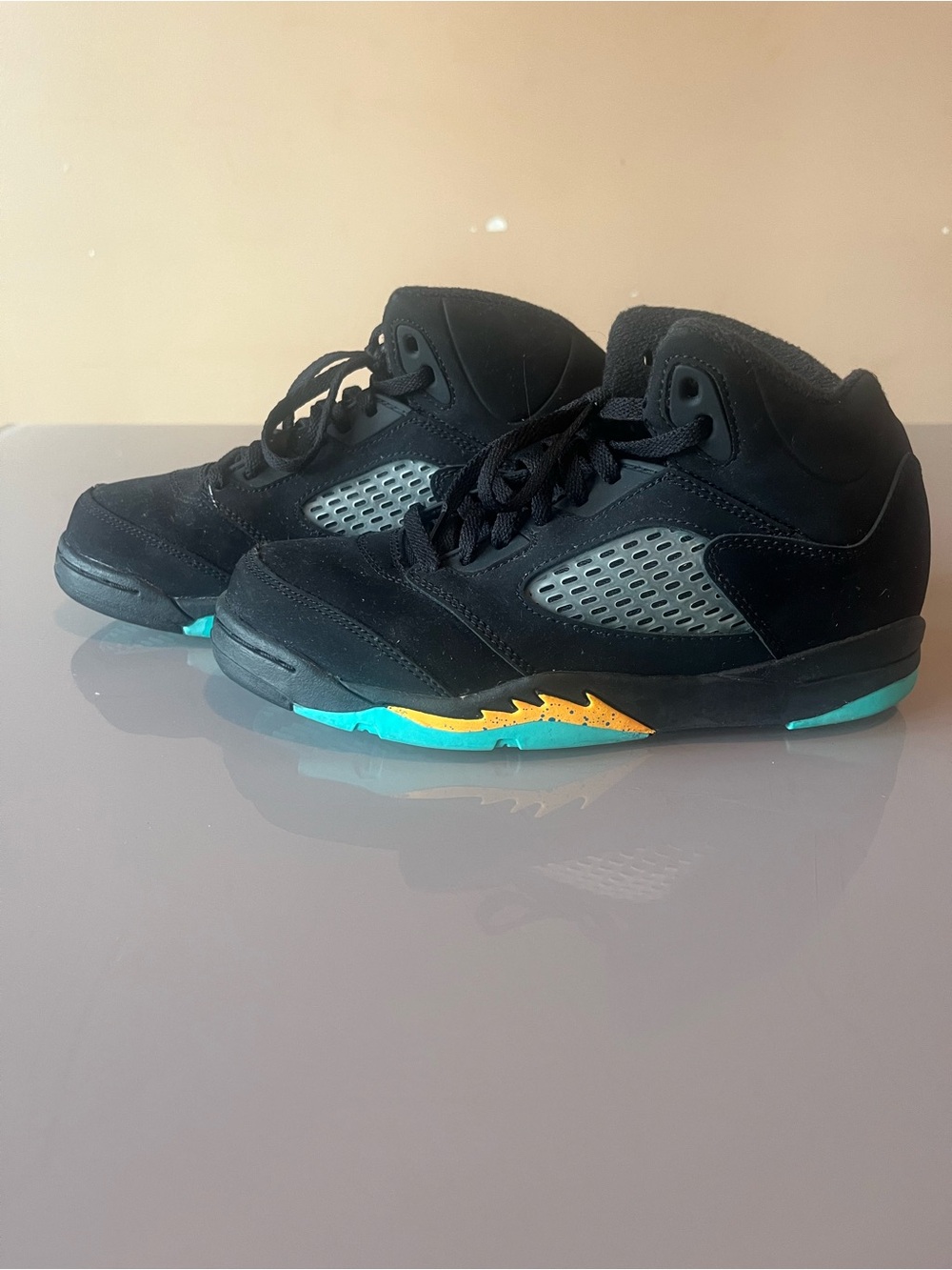 Jordan Kids Black Sneakers with Teal & Yellow Accents